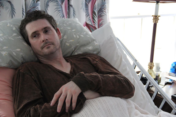 Due to his illness, Jeffrey A. Lill sleeps up to 16 hours a day in a hospital bed in Rochester, N.Y. (Photo by J.J. Barrow.)