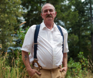 Chuck Lyon, a medical marijuana patient and grower does his part to conserve water by capturing 60,000 gallons of rainwater every year. (Photo by Brittan Jenkins/News21.)