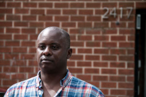 Corey Barnette, owner of District Growers, stands outside the intentionally nondescript building of his cultivation center in northeast Washington, D.C. Barnette said the marijuana industry is “dominated by white men.” (Photo by Karen Mawdsley/News21.)